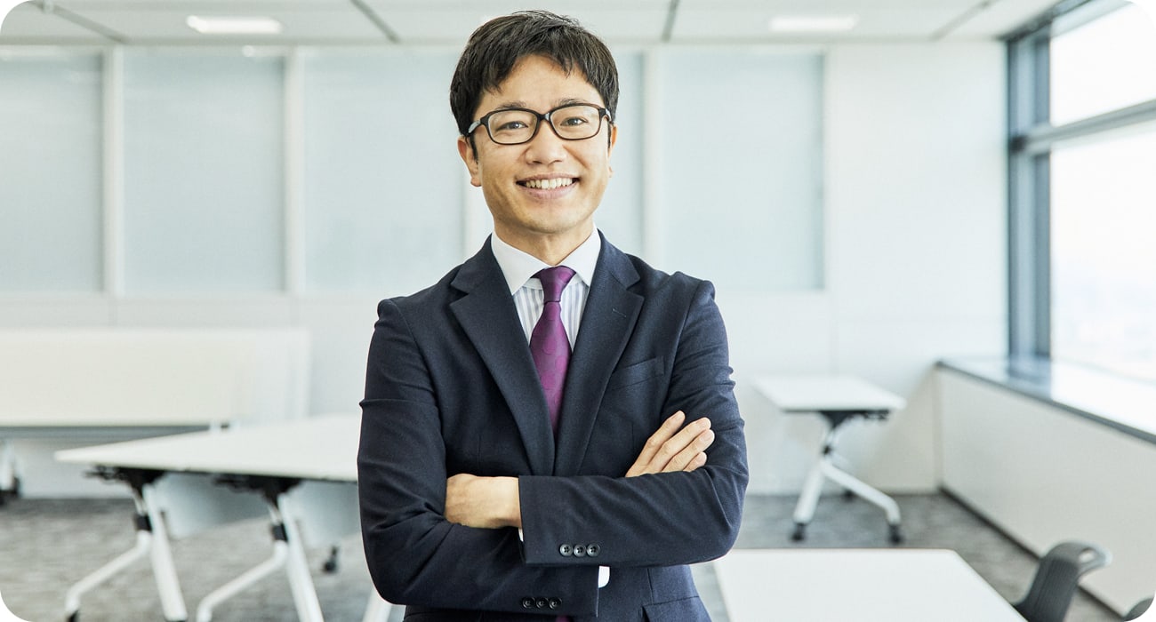 社員第一号の服部さんの写真